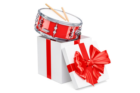Drum inside gift box, gift concept. 3D rendering