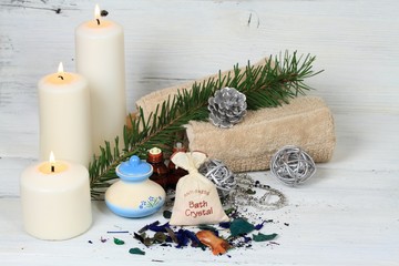 Winter spa concept, candle, aromatic herb, anti stress bath
