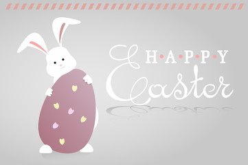 Easter,cute Bunny hiding behind an egg.