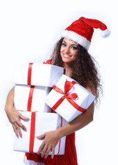 Excited attractive woman with many gift boxes and bags.