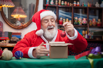 Father Christmas packing toys for children