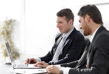 Fototapeta premium close-up.businessman working with laptop at his Desk.