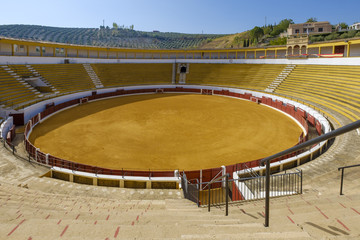 large bullring with yellow sand