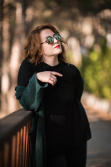 Woman with Sunglasses Possing at the Park