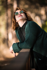 Woman with Sunglasses Possing at the Park