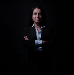 Full-length portrait of businesswoman  isolated on black backgro