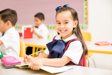 Fototapeta premium Beautiful preschool student in a classroom