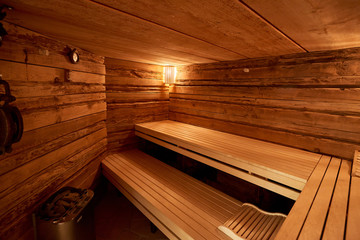 spa, relaxation and healthcare in finnish wooden sauna room