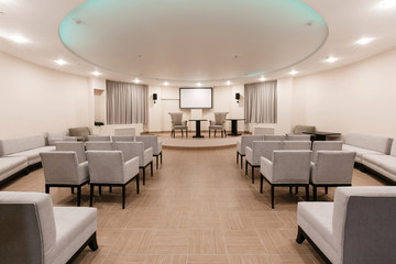 Row of chairs in boardroom. seats in an empty conference room