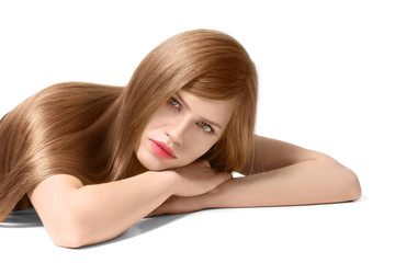 Fototapeta premium Attractive young woman with beautiful long hair on white background