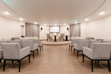 Row of chairs in boardroom. seats in an empty conference room