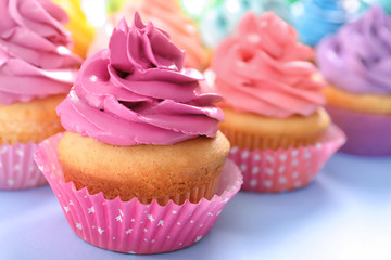 Delicious cupcake on table, closeup