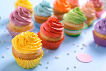 Delicious cupcake on table, closeup