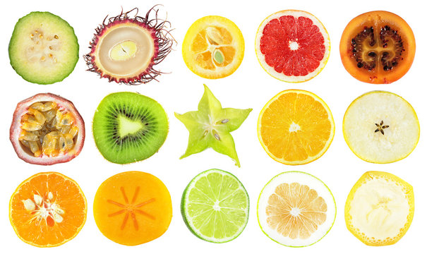 Set of slices of different exotic fruits isolated on white background