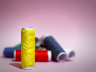  Threads on a pink background