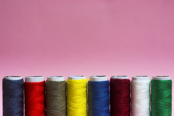  Threads on a pink background