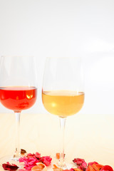 Two glasses with red and white wine