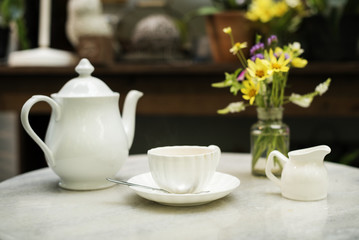Fototapeta na wymiar A white porcelain tea set