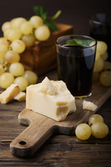 Concept of Italian food with wine, grape and cheese