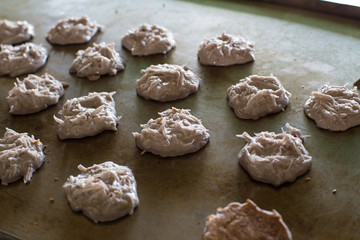 Thai dessert menu made from coconut and flour cooking on iron plate pan.