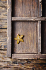 Concept of Christmas card on the wooden background, selective focus