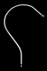 Hook from a hanger on a black background macro