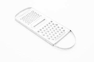 Metal grater on white background