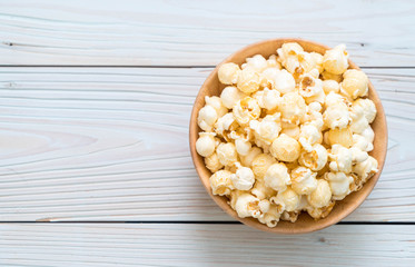 sweet popcorn on wood