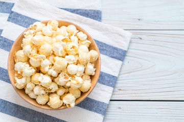 sweet popcorn on wood