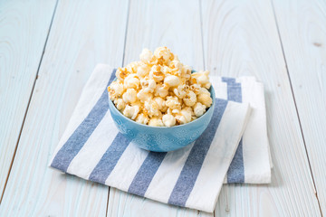 sweet popcorn on wood