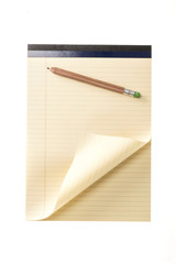 yellow rolling empty note with pencil isolated on the white background.