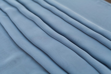 Obraz premium Color blue textil, silk fabric with pleats