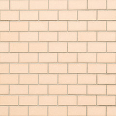Vintage brown brick wall seamless background and texture