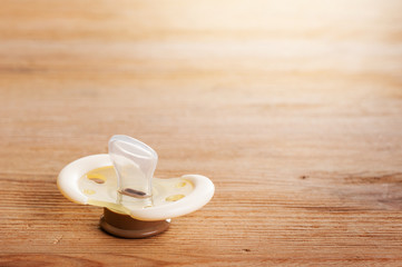 yellow baby pacifier