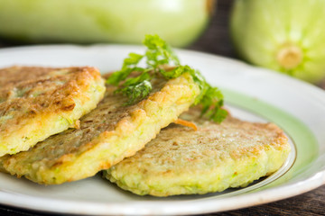 Zucchini pancakes on plate