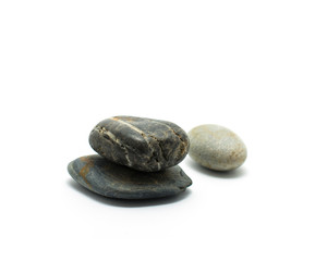 Fototapeta na wymiar Three stones are stacked isolated on white background. Zen stone.