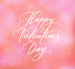 Happy Valentines day text on blurred background.