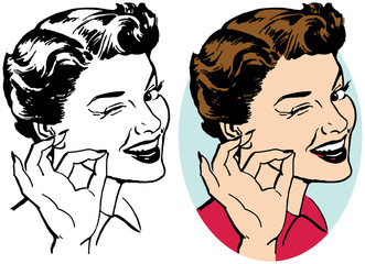 A woman winks and makes an okay gesture with her fingers