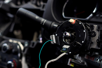 Fototapeta premium closeup car steering wheel repair after the accident with soft-focus and over light in the background