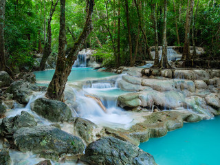 Naklejka premium Deep forest waterfall in Thailand (Erawan Waterfall).