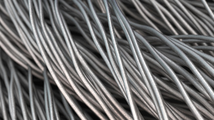 Twisted aluminum wires on black surface