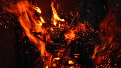 Fototapeta na wymiar Fire flames with sparks.