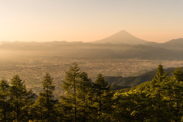 Mt.Fuji and Kofu city with sunrise sky seen from Mt. Amariyama view point.