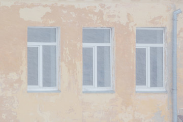 Windows of the house in the snow