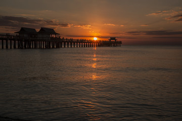 Fototapeta na wymiar Colorful sunset at Naples Florida pier