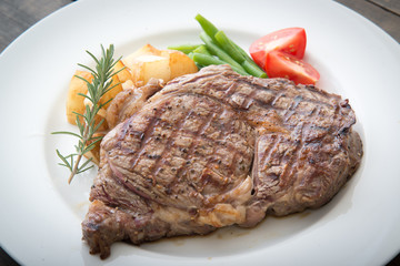 boneless rib eye steak on plate