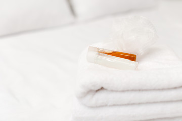 Clean towels on bed at hotel room