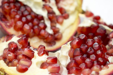 berries ripe Pomegranate on white background