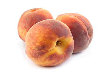 Fototapeta na wymiar Peach fruit on white