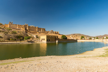 Fototapeta na wymiar Amber Fort, famous travel destination in Jaipur, Rajasthan, India. The impressive landscape and cityscape.